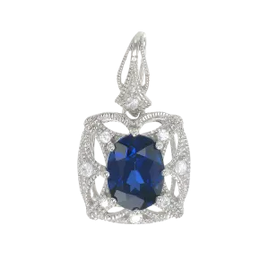 Graceful Blue Sapphire Pendant with Filigree Detail