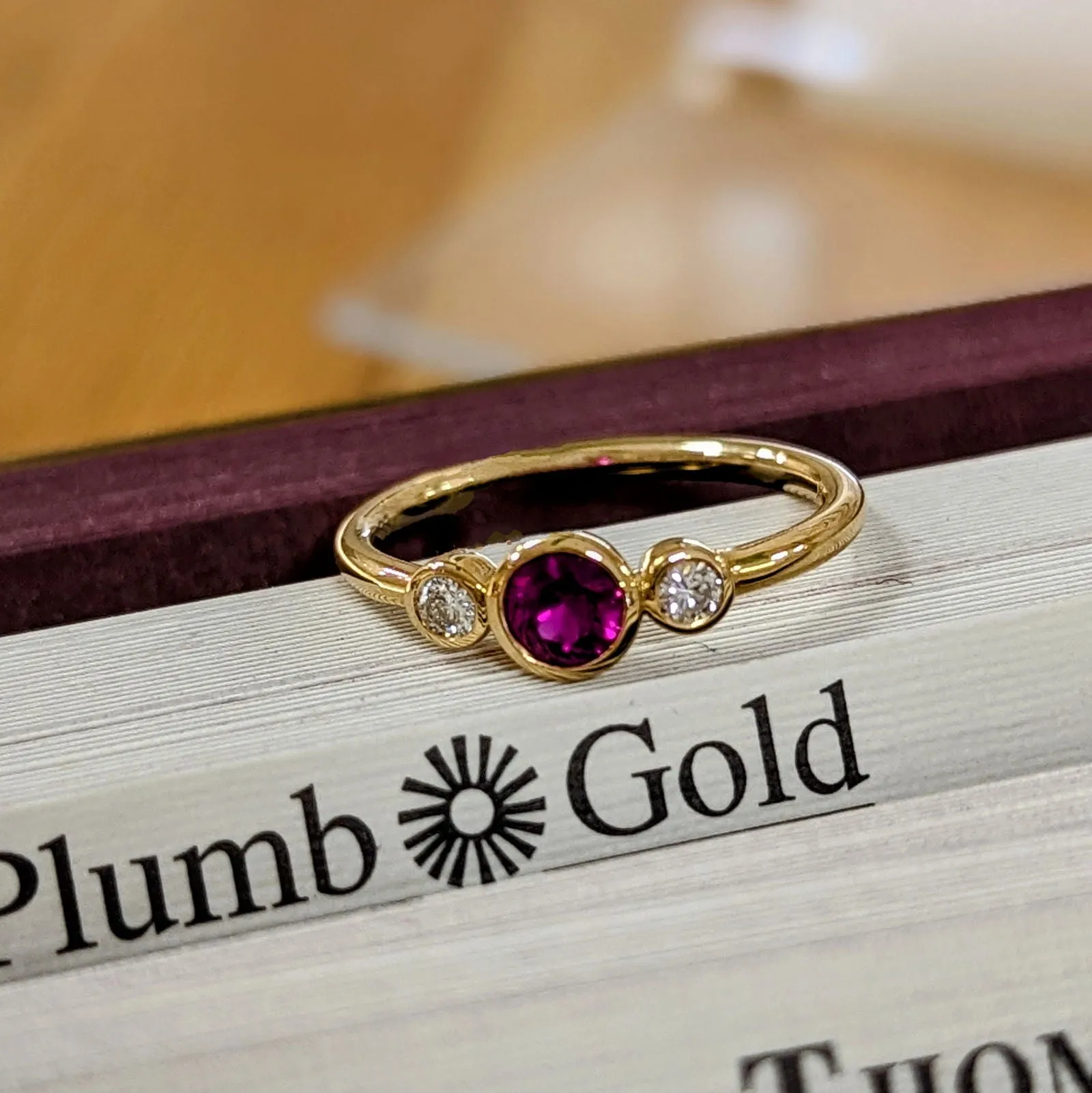 Three Stone Bezel Ring