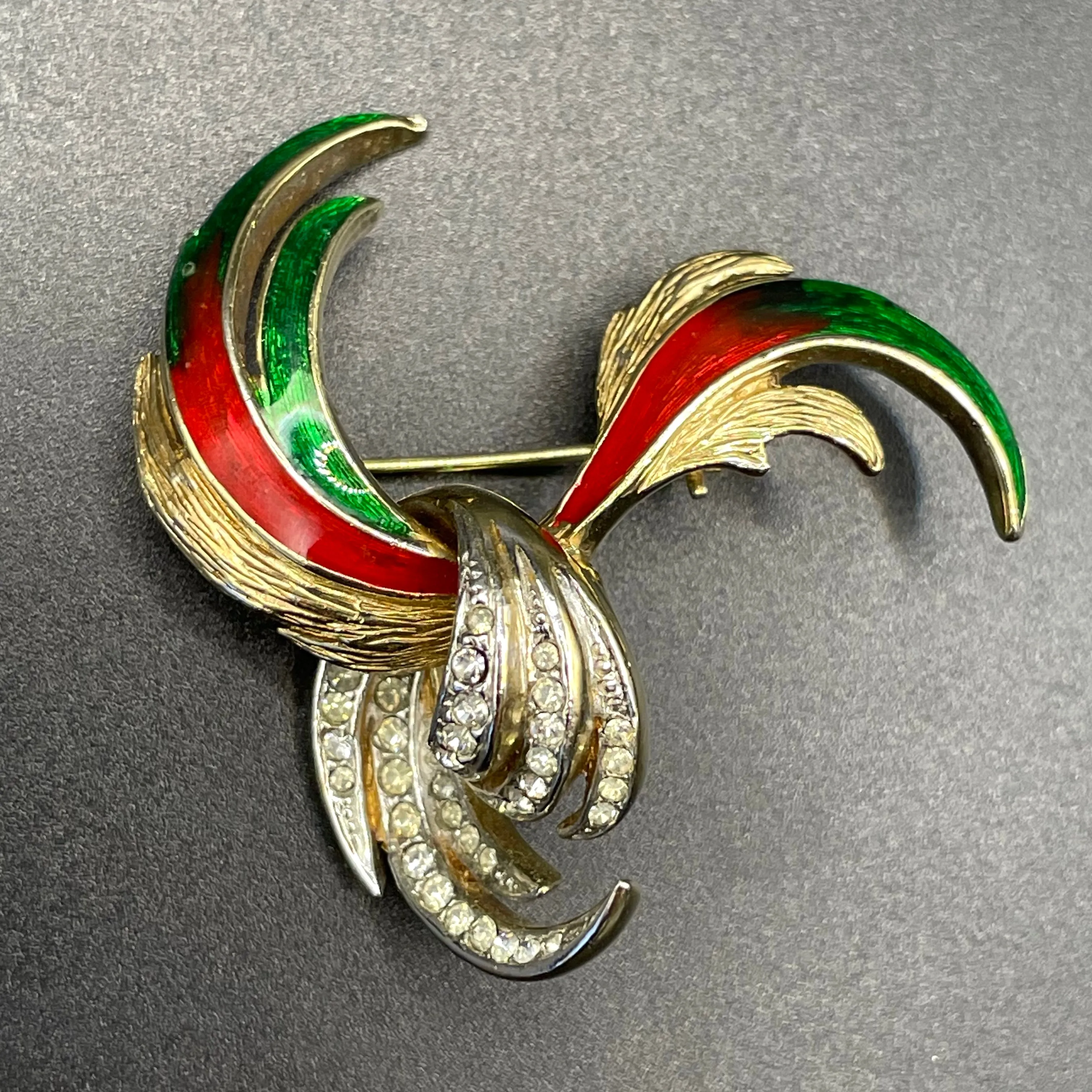 Vintage Attwood and Sawyer abstract swirl brooch, 22ct gold plated, red and green enamel and clear rhinestones, signed A&S